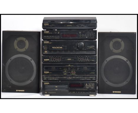 A vintage retro Pioneer music stacking system to include speakers , records player , radio , cassette etc. Stacking system me