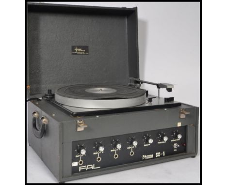 A vintage 20th century Goldring Lenco GL72 / GL 72 vinyl record player deck housed within a Fal Phase 50- 4 body. Measures 37