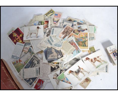 A shoe box of vintage cigarette cards , many hundreds of odds and part sets - Wills , Players , Ogdens etc. Please see images