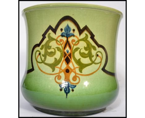 A stunning 19th century Art Nouveau large ceramic Majolica planter, two tone glaze with hand painted decoration. Measures 28 