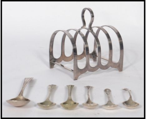 A group of silver hallmarked items to include a near pair of 19th century Victorian&nbsp; mustard / condiment / chocolate spo