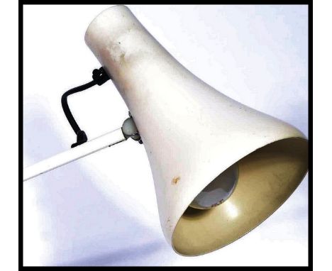 A 20th century retro Herbert Terry Anglepoise desk lamp having a circular base with conical shade in original white paint fin