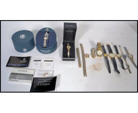 A collection of ladies and gents rings to include a Citizen eco - drive boxed ladies watch in working order, a cased ladies S