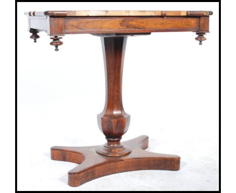 A 19th century rosewood occasional / writing table with square top, having single frieze drawer, on tapering pedestal and fou