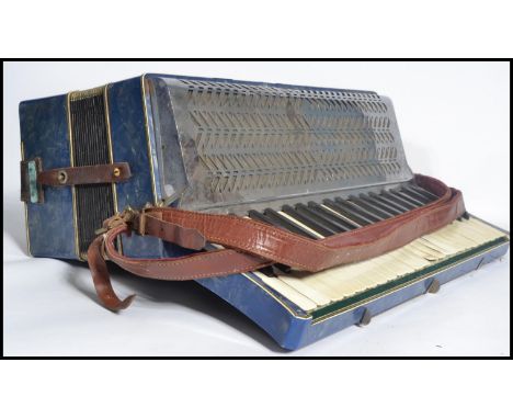 A vintage 20th century Apollo accordion musical instrument in original case. Measures 22 cm high and 53 cm wide.