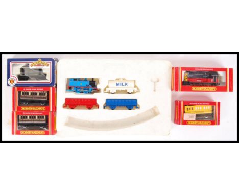 A collection of original Hornby 00 gauge railway trainset items comprising of; R446 GWR Coach (2x), R050 BR Shunter &amp; Bac