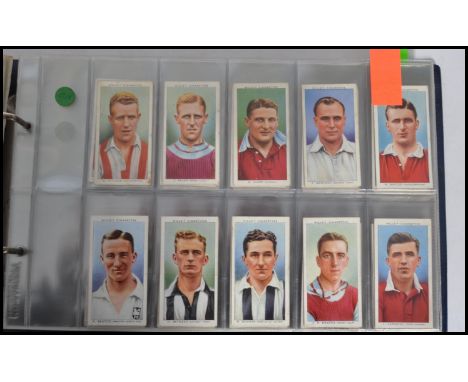 Cigarette cards; two albums of cigarette cards, all appearing to be full / complete sets (unless stated), to include; Churchm