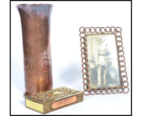 A group of three vintage 20th century Trench Art brass items to include a picture frame with a photograph of an Africa Corps 