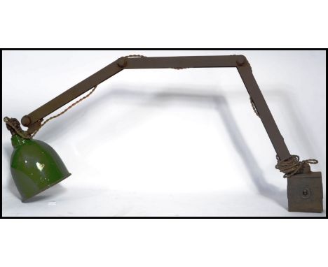 A vintage mid 20th century Industrial metal and enamel anglepoise desk lamp. Block flicker switch base with angled twin arm h