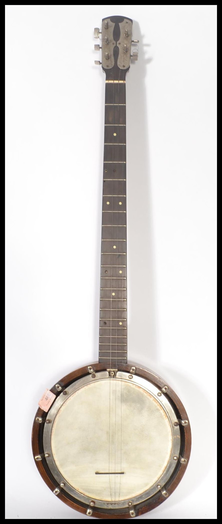 An early 20th century 4 string banjo musical instrument the head stock ...