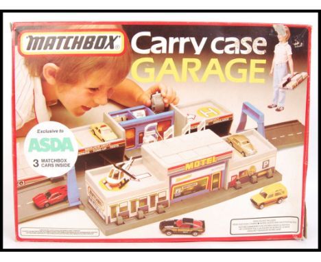 An original vintage Matchbox ASDA Exclusive CC18 Carry Case Garage. Appears complete with stickers &amp; 3x diecast cars. Wit