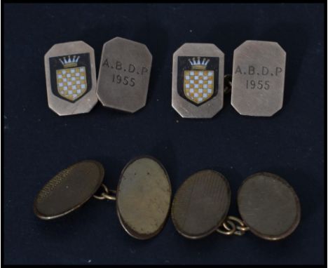 Two pairs of vintage 20th century gold cufflinks cuffs , one being a hallmarked 9ct gold example having an enamel crest and t