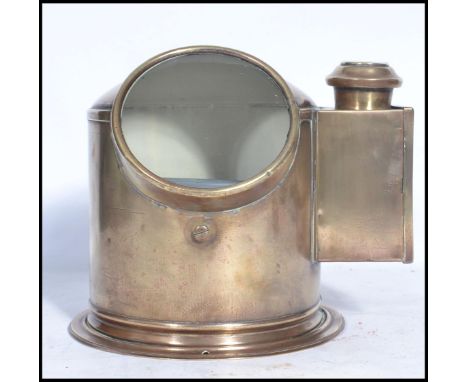 A good late 19th century brass and copper ships binnacle having oil lamp mount to side of the cylindrical body with glass por