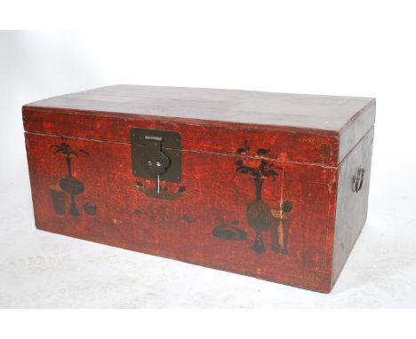 An antique Chinese Gansu province popular wood storage trunk / blanket box / coffer&nbsp;having a red lacquer with handpainte