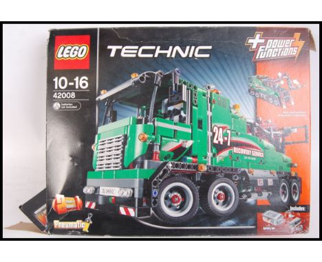 A Lego Technic 42008 Recovery Service boxed set, with some contents still within their sealed bags, with others loose. Within