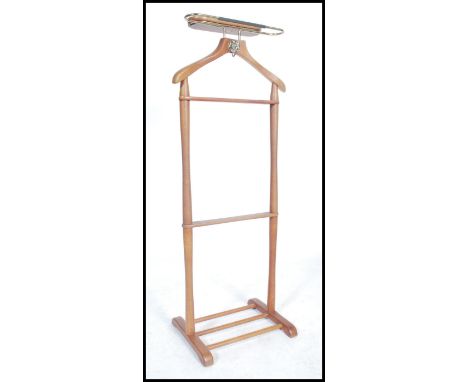A vintage mid century light beech wood gentleman's valet stand having railed top and stretchers to base.&nbsp;Measures&nbsp; 