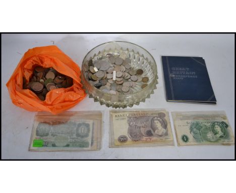 A collection of assorted coins together with vintage bank notes&nbsp;
