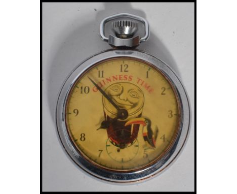 A vintage 1960's&nbsp;automaton Guinness Ingersoll chrome cased open face pocket watch, the face decorated with a smiling pin