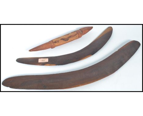 Two vintage 20th century Australian Aboriginal boomerangs with a small carving of a lizard. Please see images. Measures 58 cm