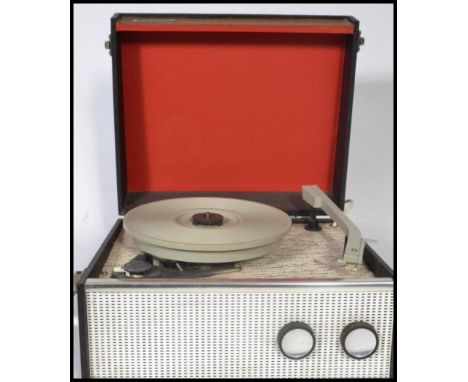 A vintage 20th century 1960's Dansette four speed portable record player in a two - tone finish. Measures 32 cm wide and 28 c
