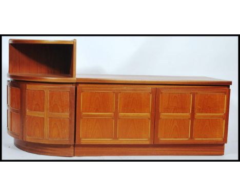 A vintage mid century teak wood Parker Knoll side cabinet unit with quarter panel front together with a modular additional Pa