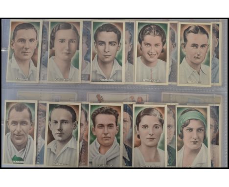 A collection of sets and part sets vintage cigarette cards held within an an album to include Wix , Phillips , Churchman , Pl