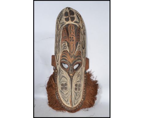 A vintage 20th century Mwai Mash tribal mask from the Tmbunam people middle Septik river area, carved from wood with natutal 