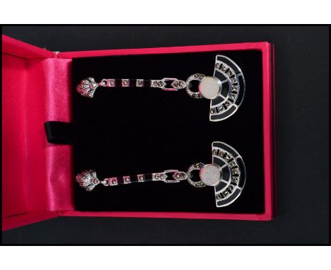 A pair of sterling silver marcasite onyx and opal set art deco style drop earrings having axe blade drops. Complete in presen