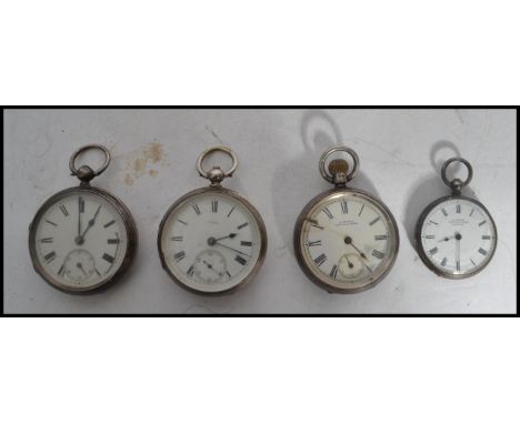 A group of four vintage early 20th century silver pocket watches to include a La Trobe , 1582 , AWW Co Waltham Mass and anoth
