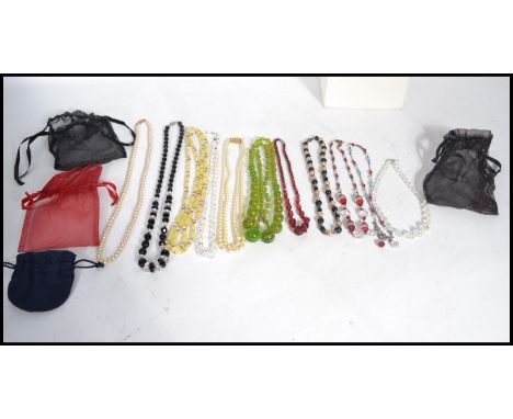 A group of vintage 20th century glass bead necklaces of various form. Please see images.