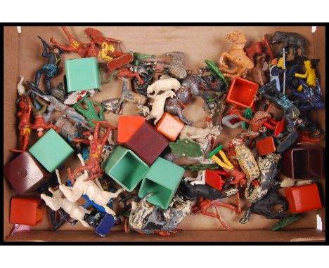 A collection of loose vintage mainly Britains &amp; Timpo lead &amp; plastic figures comprising of; cowboys, Indians, farm an