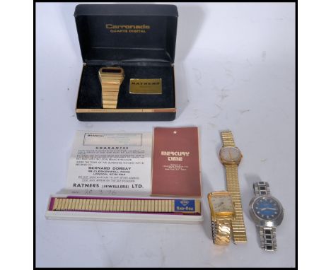 A group of vintage 20th century watches to include a boxed retro gilt Carronade Quartz watch a Roamer watch and two vintage R