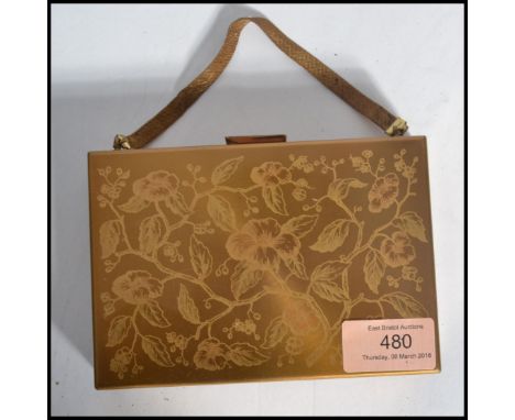 A vintage mid 20th century gilt metal purse of rectangular form, carry handle atop with the purse opening to reveal a fully a