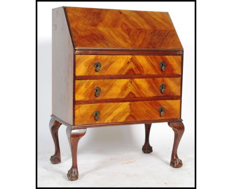 A vintage 20th century mahogany bureau, fall front with fully appointed interior together with a pair of vintage elm chapel c