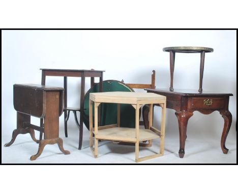 A collection of 20th century vintage occasional tables dating from the turn of the 20th century to include&nbsp; a mahogany E