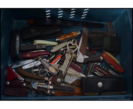 A collection of vintage pen knives - penknives to include vintage mother of pearl, bark effect, swiss army and many more. Lon