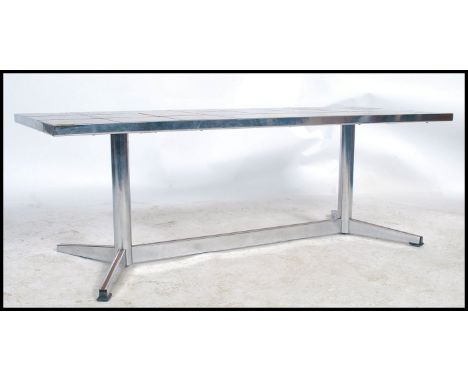 A Belgian mid 20th century retro chrome and tile top coffee occasional table. In the manner of J Belarti (Belgian) with abstr