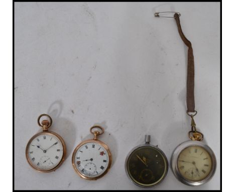A group of four vintage early 20th century pocket watches to include two gold plates pocket watches , a Services pocket watch
