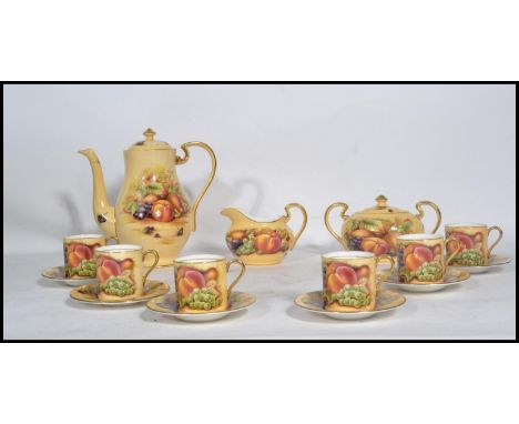 An Aynsley Orchard Rose tea service consisting of tea pot , lidded sugar bowl , creamer milk jug six cups ans saucer. Teapot 