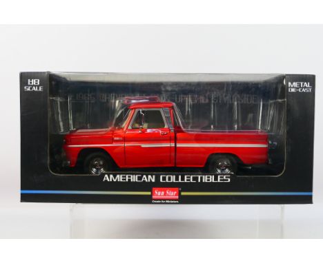 Sun Star - A boxed 1:18 scale Sun Star #1361 'American Collectibles' 1965 Chevrolet Pick-Up C-10 Styleside. The model in red 