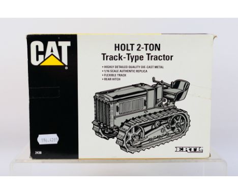 Ertl - An unopened 1:16 scale Caterpillar Holt 2-ton track type tractor special edition from 1993 # 2438. The model appears M