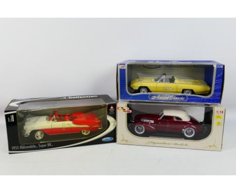 Signature Models - Anson - Welly - Three boxed 1:18 scale diecast model cars. Lot comprises of Signature Models #18112 1937 C