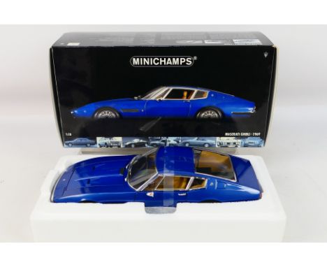 Minichamps - A boxed Minichamps #100123320 1:18 scale 1969 Maserati Ghibli Coupe. The model in metallic blue has a very small