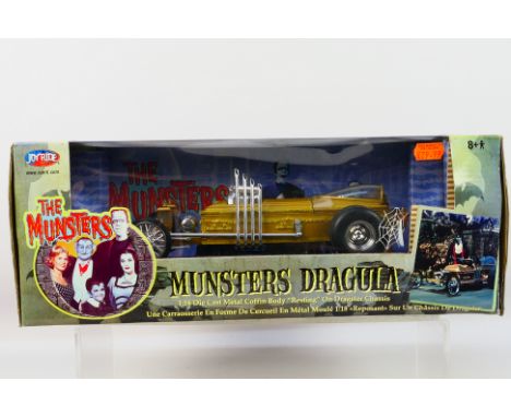 Joyride - A boxed 1:18 scale Joyride #33266 'Munsters Dragula'. The model appears to be in Mint condition, housed within a Fa