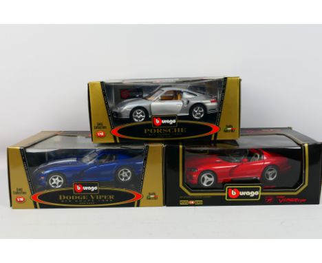 Bburago - Three boxed 1:18 scale diecast model cars from Bburago. Lot consists of #3367 1999 Porsche 911 Turbo; #3330 1996 Do