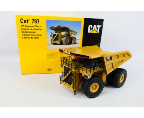 NZG - A 1:50 scale CAT 797 off highway dump truck from 2001 # 466. The model appears in Mint condition in Very Good original 