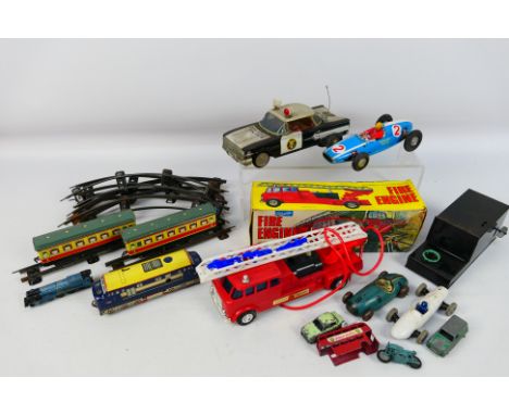 Matchbox - Brimtoy - Telsalda -  An assortment of unboxed tinplate items including an unboxed Brimtoy windup train set with d