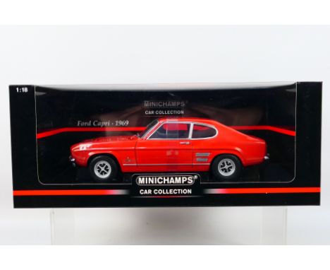 Minichamps - A boxed Minichamps #150089000 1:18 scale 1969 Ford Capri. The model in red appears to be in Mint condition, hous