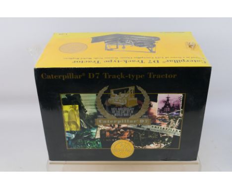 Norscot NZG - A factory sealed limited edition 1:25 scale Caterpillar D7 Track-type tractor # 386. It is number 7668 of 10000