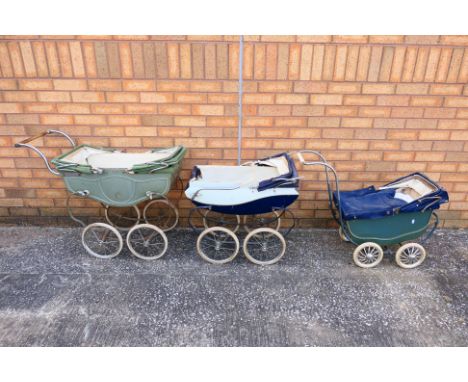 Three vintage children's toy prams. Prams show age and play wear appearing Poor - Fair in general. All items are unchecked fo